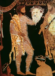 Detalj från en vas med röd figur som visar en skådespelare som håller sin mask, hittad i Ruvo, ca 410 f.Kr.